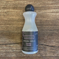 Bottle of Eucalan delicate detergent on a wooden surface