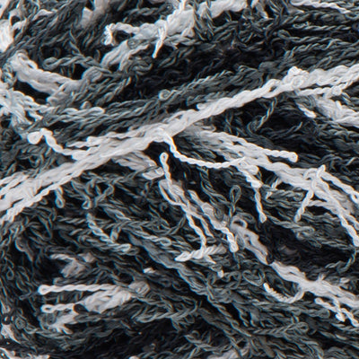 Close up of textured black, grey, and white yarn 