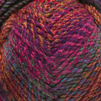 Close-up of a skein of orange, pink, purple, and blue yarn