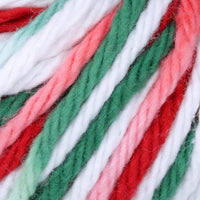 Close-up of red, green, and white yarn strands.