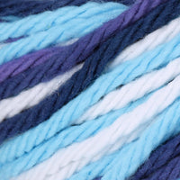Close-up of blues, purple, and white yarn strands.