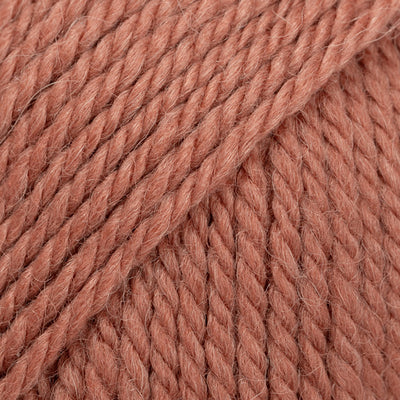 Close-up of pink/rust coloured yarn