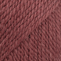 Close-up of reddish rust coloured yarn 