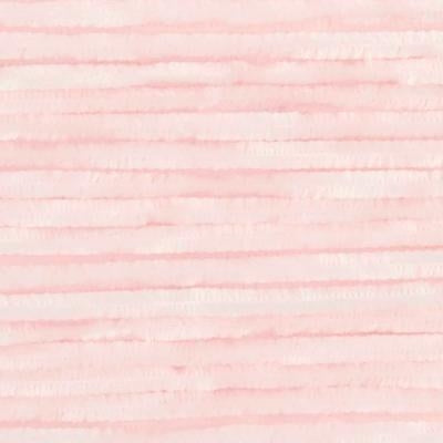 Close-up of pale pink yarn with a fuzzy texture