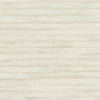 Close-up of cream yarn with a fuzzy texture