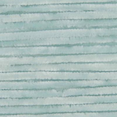 Close-up of pale aqua yarn with a fuzzy texture