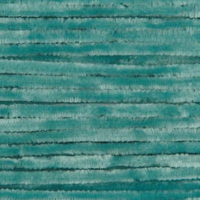 Close-up of light teal yarn with a fuzzy texture