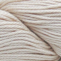 Close-up of beige yarn with a slight texture