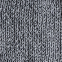 Close-up of a knitted gray fabric 
