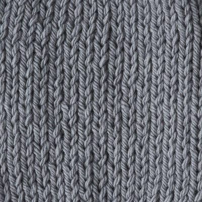 Close-up of a knitted gray fabric 