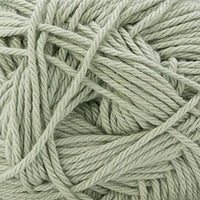 Close-up of a ball of light green yarn