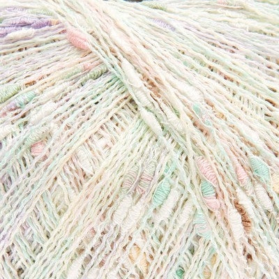 Detail of very pale textured yarn in pastel shades of pink, purple, and mint