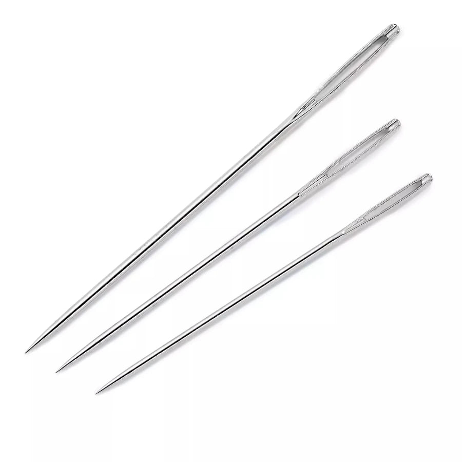 Three sharp metal embroidery needles on a white background