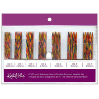 Set of double-pointed knitting needles in rainbow wood design with packaging displaying size information.