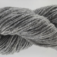 Close-up of gray yarn on a light background