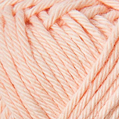 Close-up of pale peach yarn ball