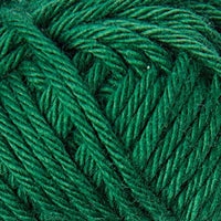 Close-up of a ball of emerald green yarn