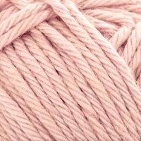 Close-up of pale pink yarn ball