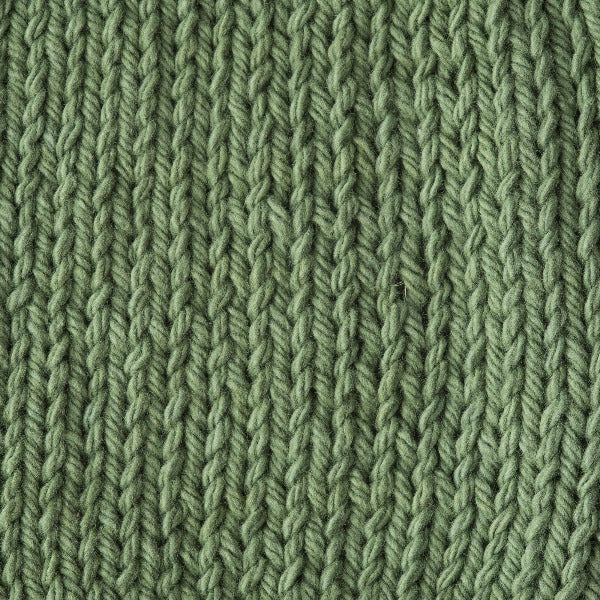 Close-up of sage green knitted fabric 