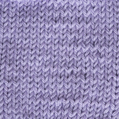 Close-up of a light purple knitted fabric 