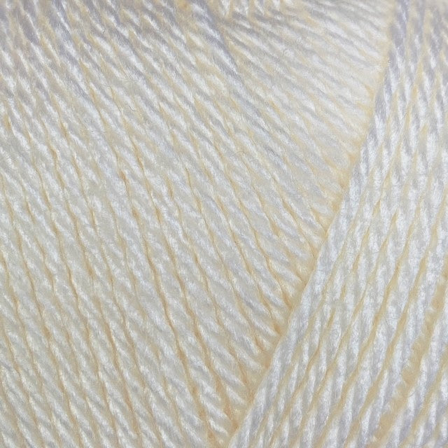 Close-up of a ball of cream-colored yarn 