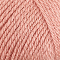 Close-up of peach coloured yarn 