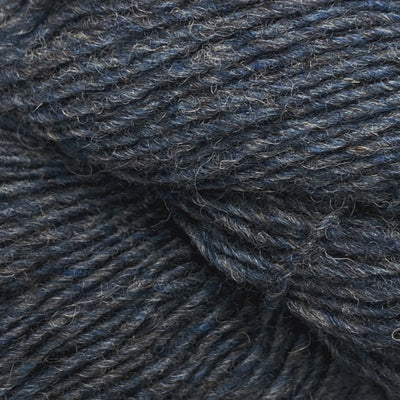 Close-up of a skein of blue heathered yarn