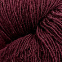 Close-up of a skein of burgundy yarn