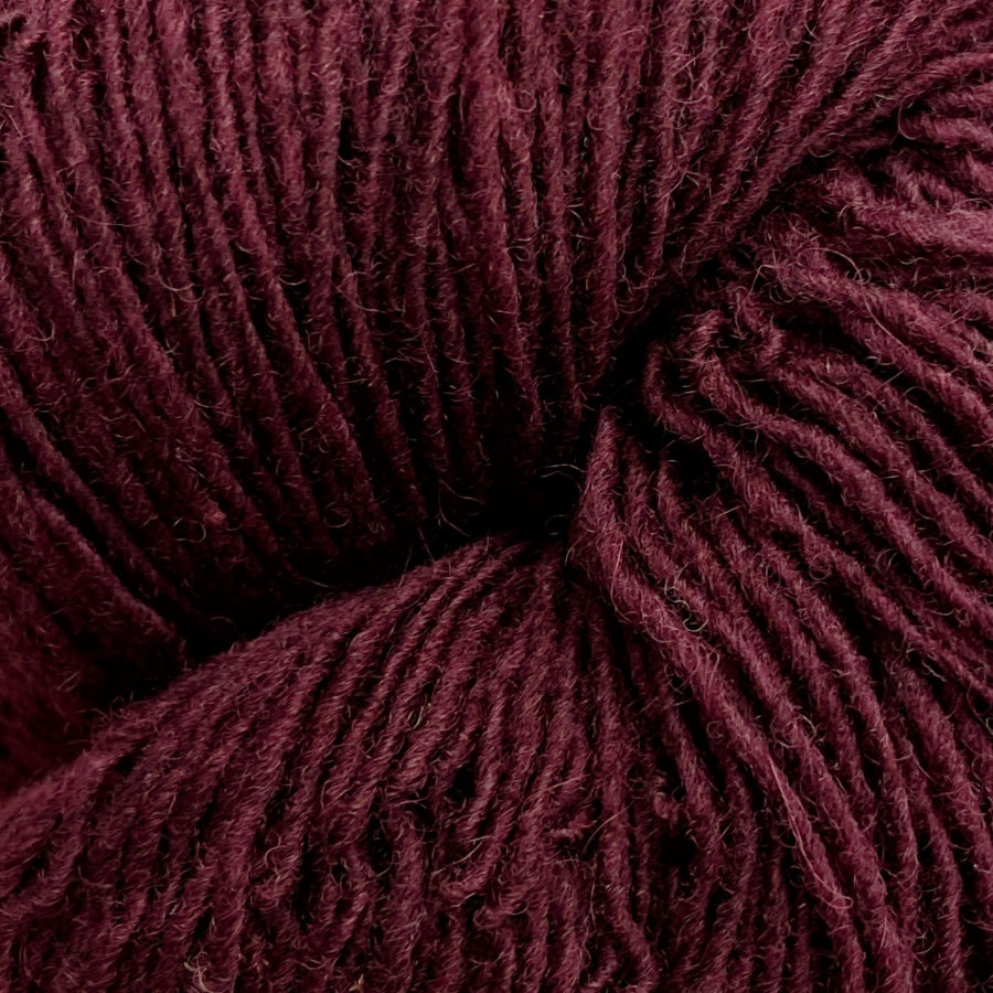 Close-up of a skein of burgundy yarn