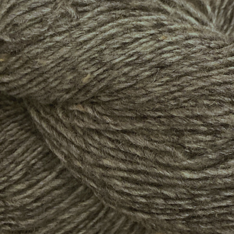 Close-up of a skein of light brown yarn