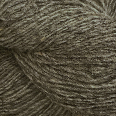 Close-up of a skein of light brown yarn