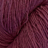 Close-up of a skein of antique rose coloured yarn