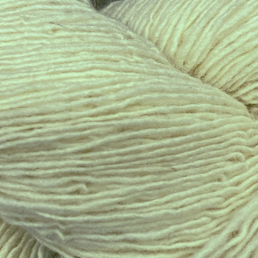 Close-up of a skein of cream coloured yarn