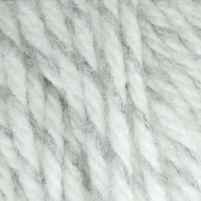 Close-up of twisted gray and white yarn strands