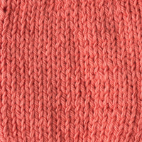 Close-up of a coral knitted fabric 