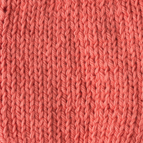 Close-up of a coral knitted fabric 