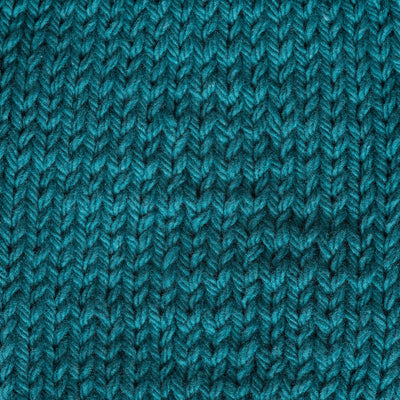 Close-up of teal knitted fabric 