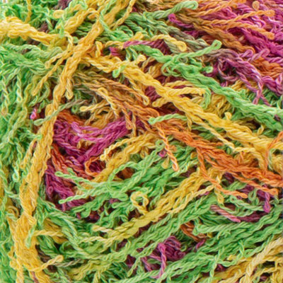 Close up of textured Green, pink, yellow, and orange yarn 