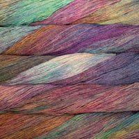 Close-up of colorful yarn strands in various shades of purple, pink, and blue.