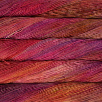 Close-up of red and pink yarn skeins