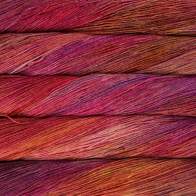 Close-up of red and pink yarn skeins
