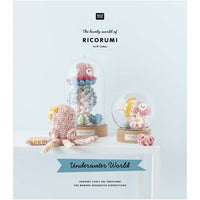 Book cover of 'The lovely world of Ricorumi Underwater World' with crocheted sea creatures on a light blue background.