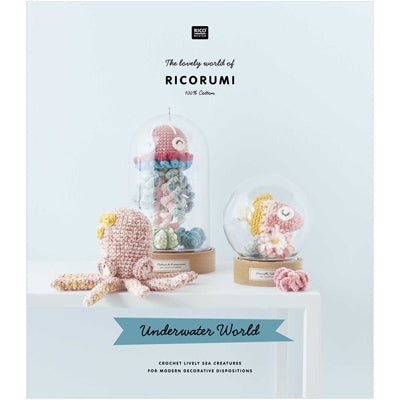 Book cover of 'The lovely world of Ricorumi Underwater World' with crocheted sea creatures on a light blue background.
