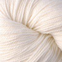 Close-up of a skein of cream-colored yarn
