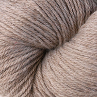Close-up of a skein of light brown yarn