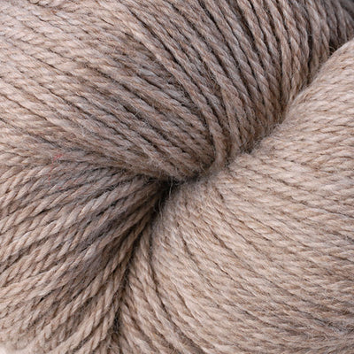 Close-up of a skein of light brown yarn