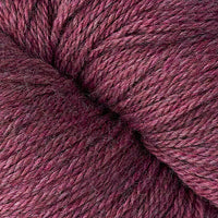 Close-up of a ball of light burgundy yarn