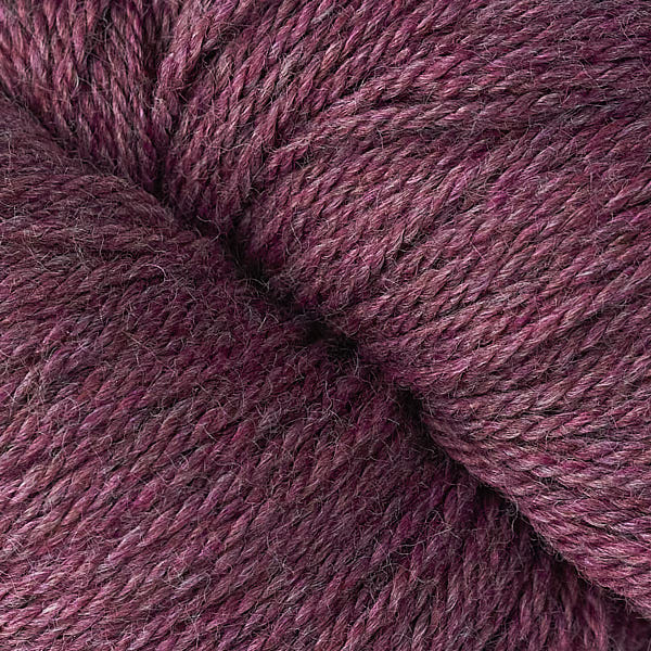 Close-up of a ball of light burgundy yarn