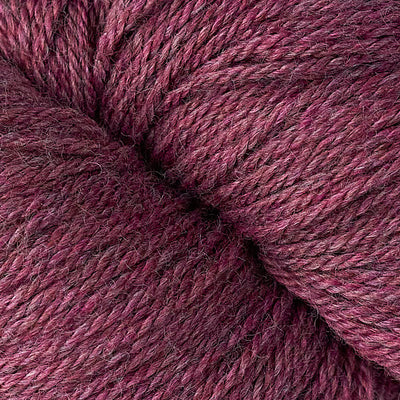Close-up of a ball of light burgundy yarn