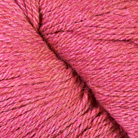 Close-up of coral pink heathered yarn 